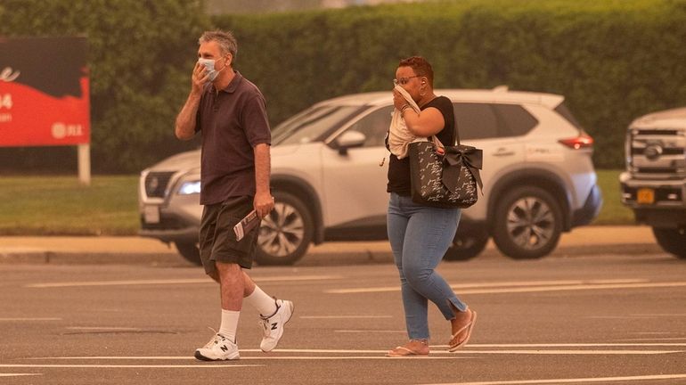 Smoke and haze covers Old Country Road and Glen Cove Road in Carle...