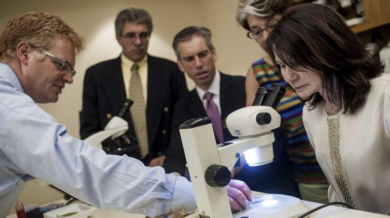 (L-R) DNA Learning Center Staff Geneticist Dr. Bruce Nash, Founding...