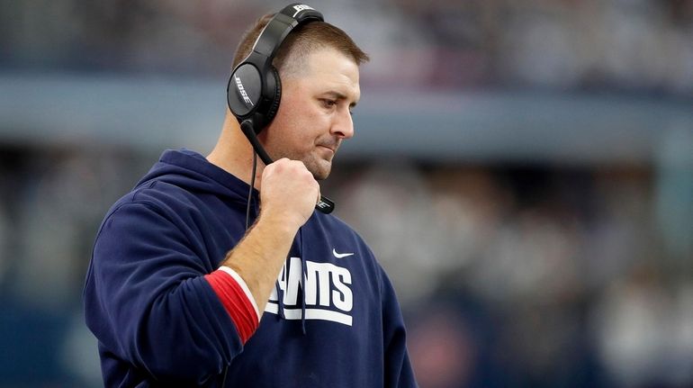 Head coach Joe Judge of the Giants looks on during the...