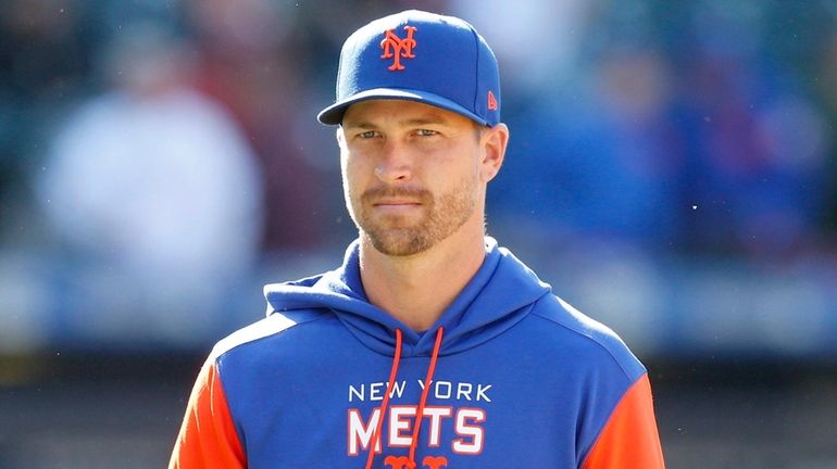 Jacob deGrom of the Mets looks on after a game against the...