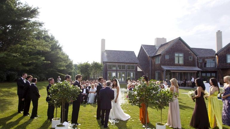 Lilly and Niklas de la Motte were married outdoors at...