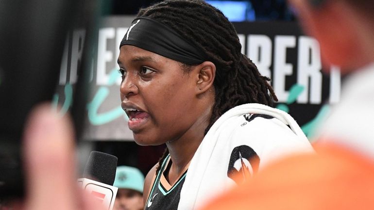 New York Liberty forward Jonquel Jones is interviewed on the...