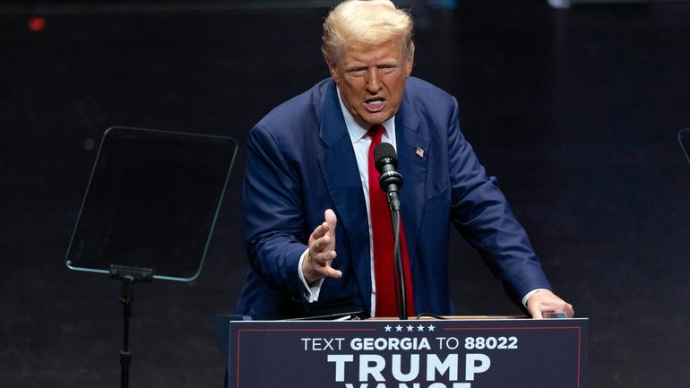 Republican presidential nominee former President Donald Trump speaks during a...