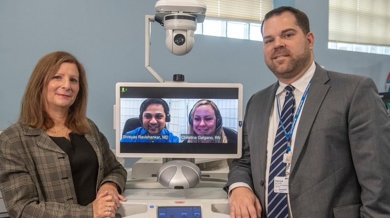 Telehealth vice president Iris Berman and director Patrick McCarthy at...