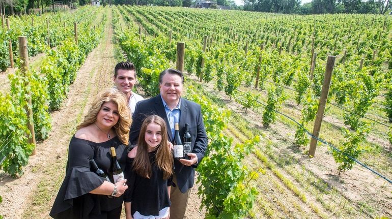 Fred Giachetti, right, owner of Del Vino Vineyard, under construction...