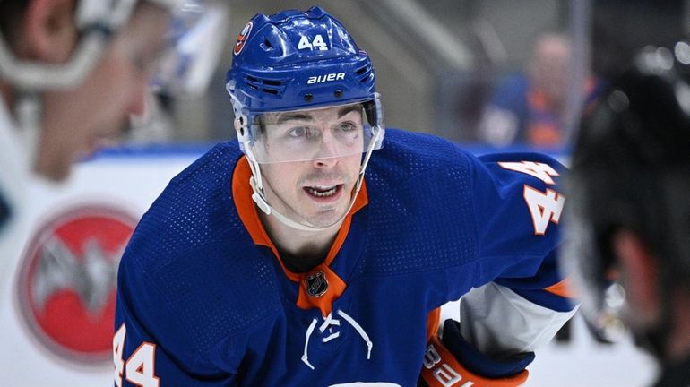 Islanders center Jean-Gabriel Pageau sets before a face off against...