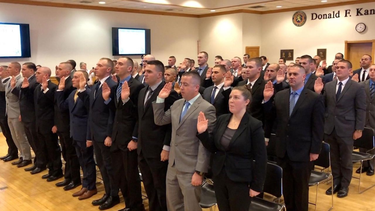 Nassau County police swear in 65 recruits for training academy Newsday