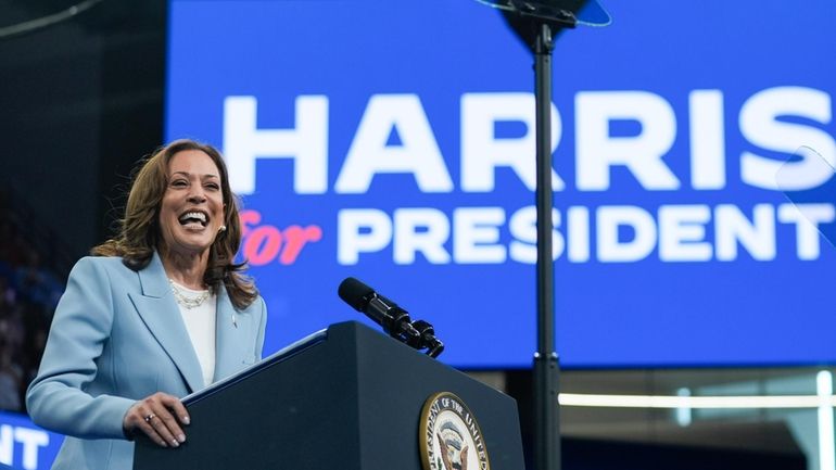 Vice President Kamala Harris speaks during a campaign rally, Tuesday,...