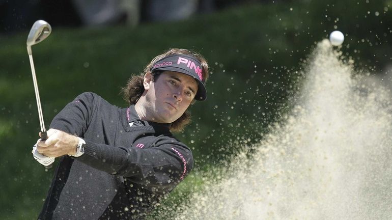 Bubba Watson hits out of a bunker on the second...