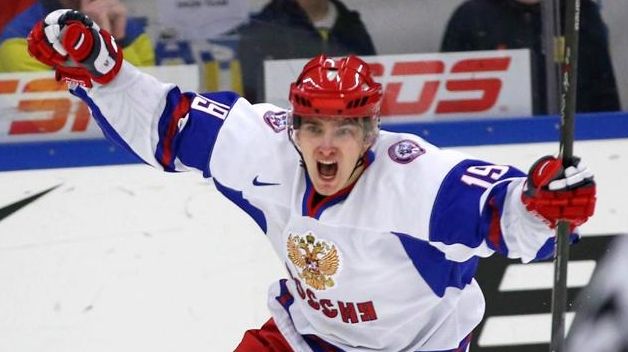 Russia's Pavel Buchnevich celebrates after scoring an empty-net goal after...