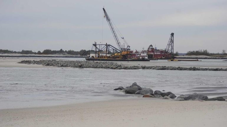 Pictured here is dredging equipment in the Moriches inlet. A...