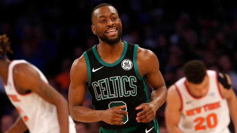 Kemba Walker of the Boston Celtics reacts after a basket...