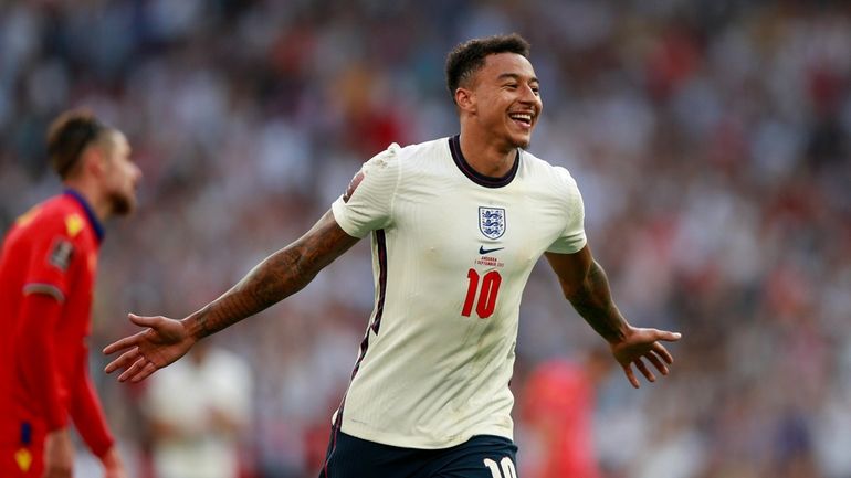 England's Jesse Lingard celebrates after scoring his side's third goal...