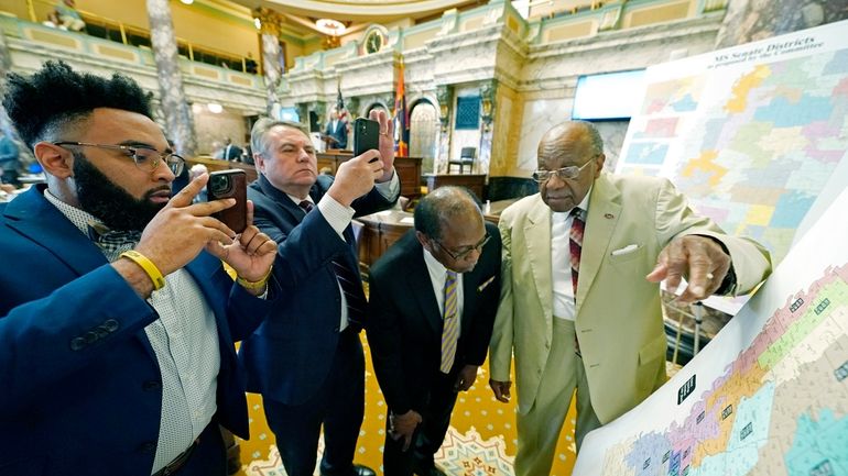 Mississippi state Sens. Rod Hickman, D-Macon, left, Michael McLendon, R-Hernando,...