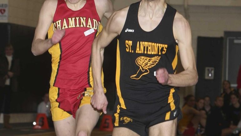 Tyler Wolfe of St Anthony's holds off Gunnar Nolan of...