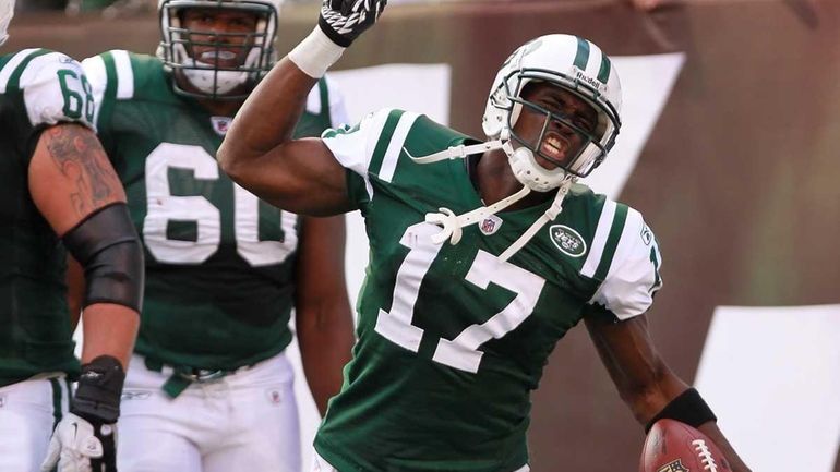 Plaxico Burress celebrates his third touchdown against the San Diego...