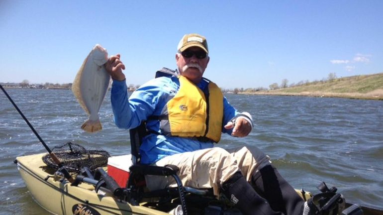 Mike Dunne is seen fishing in Middle Bay near Empire...