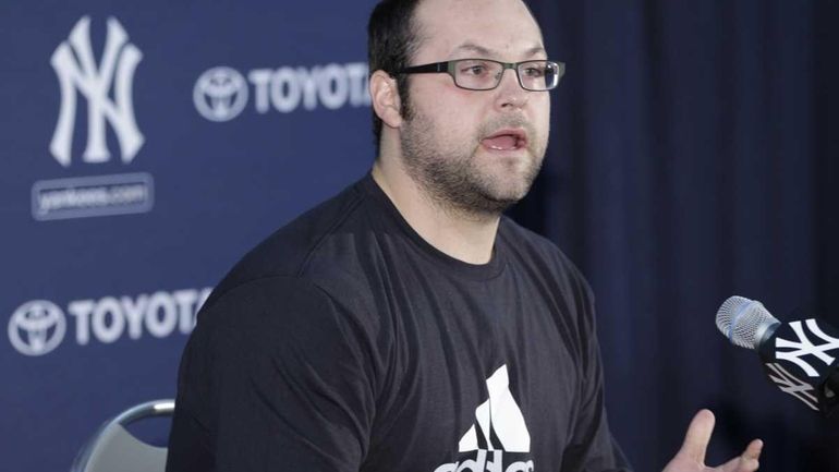 New York Yankees relief pitcher Joba Chamberlain, who injured his...