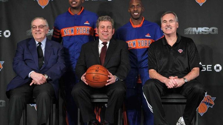 New York Knicks newest basketball players Carmelo Anthony, second from...