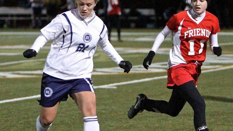 Stony Brook midfielder Donna Liotine #21 dribbles past Friends midfielder...