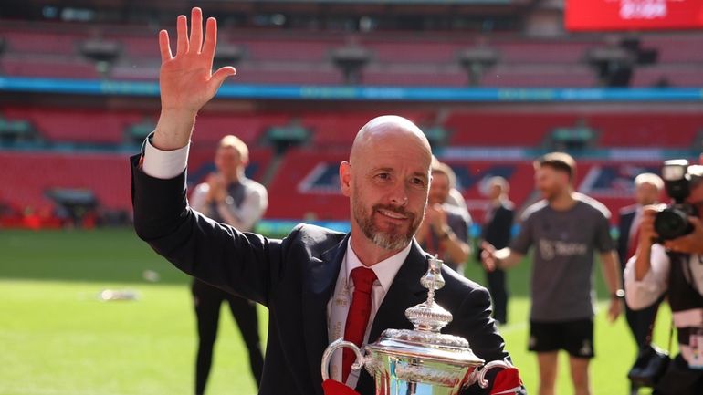 Manchester United's head coach Erik ten Hag celebrates with the...