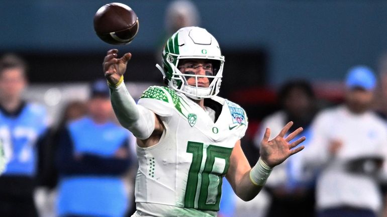 FILE -Oregon quarterback Bo Nix throws a pass during the...