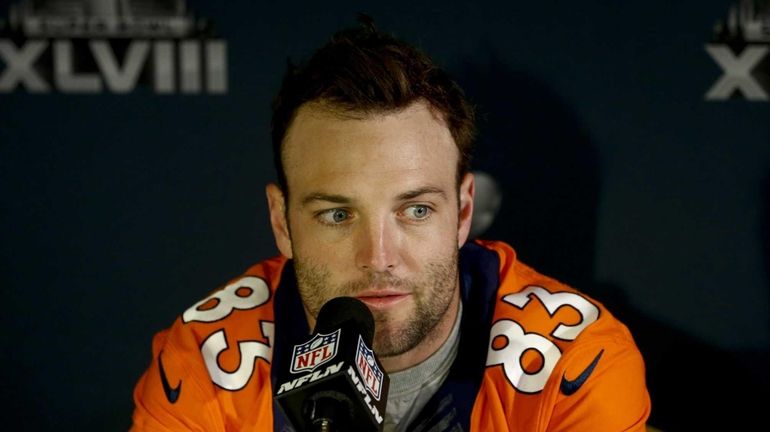 Wes Welker of the Denver Broncos speaks to the media...