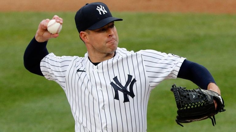 Corey Kluber of the Yankees pitches during the second inning against...