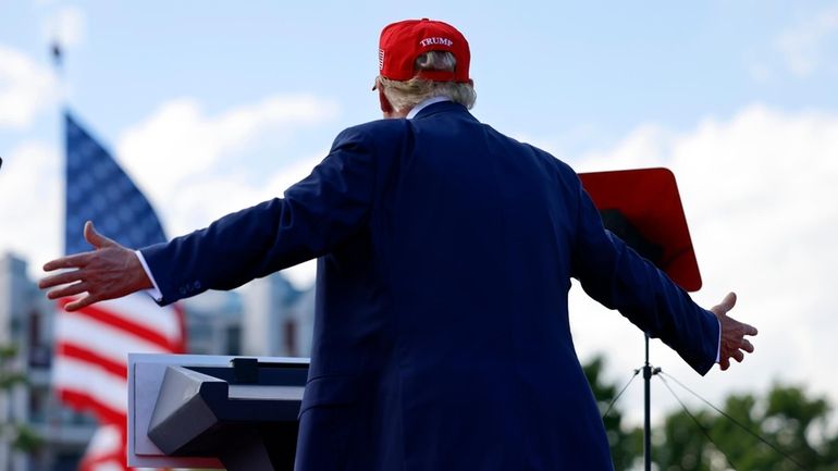 Republican presidential candidate former President Donald Trump speaks at a...