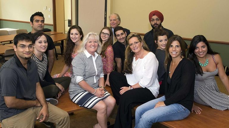 Buncee owner Marie Auturi, center right, and Monique Gablenz, head...