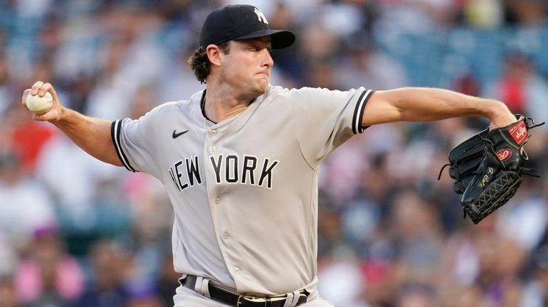 Yankees starting pitcher Gerrit Cole throws during the first inning of...