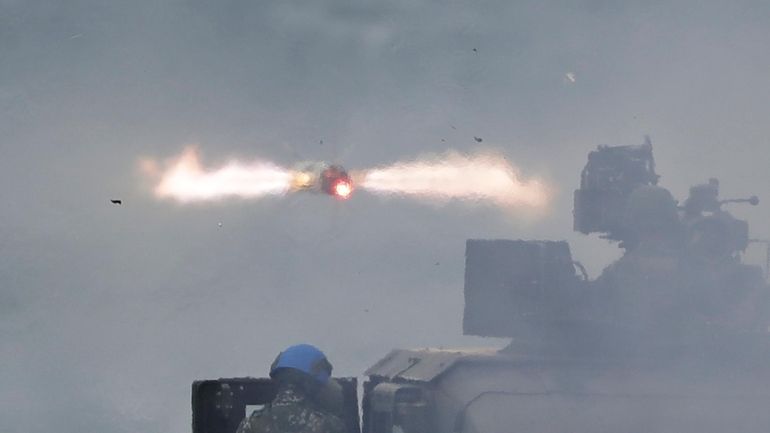 A BGM-71A anti-tank missile is fired from a M41A7 TOW...