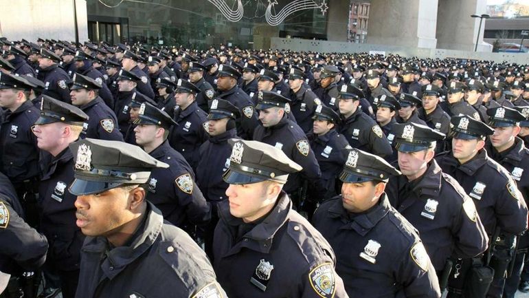 Police line up outside the Adam Clayton Powell Jr. State...
