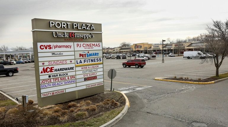 The Port Plaza shopping center on Route 112 in Port...