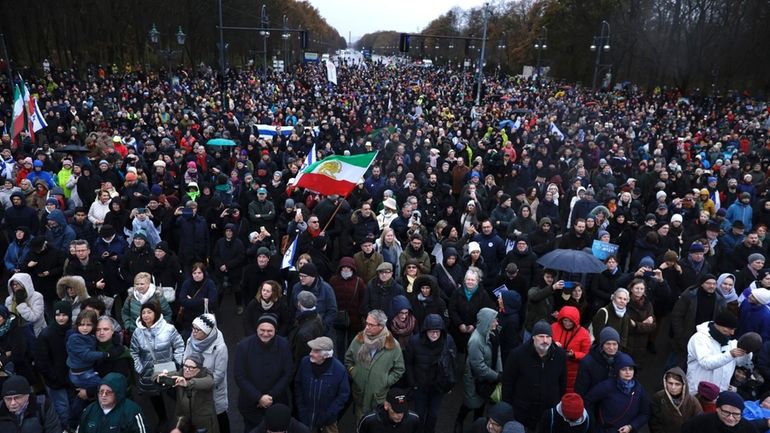 Participants in a demonstration protest against anti-Semitism under the slogan...