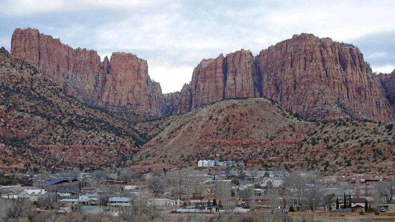 Hildale, Utah, is pictured sitting at the base of Red...