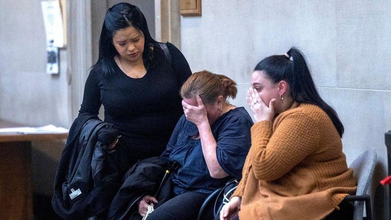 Christopher Curro's mother, Susanne Curro, center, after the acquittal of...