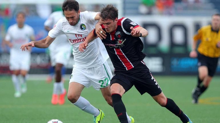 Cosmos forward Alessandro Noselli #22 and Ottawa Fury defender Mason...