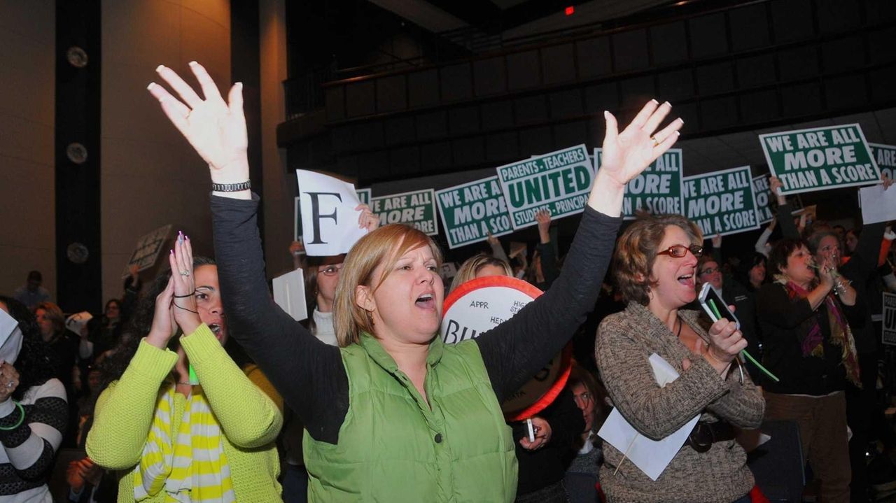 Teacher's suit over union dues settled Newsday