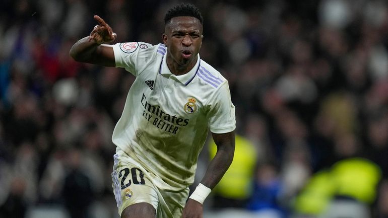 Real Madrid's Vinicius Junior celebrates after scoring his side's third...