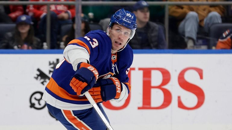 Casey Cizikas #53 of the Islanders skates against the Washington...