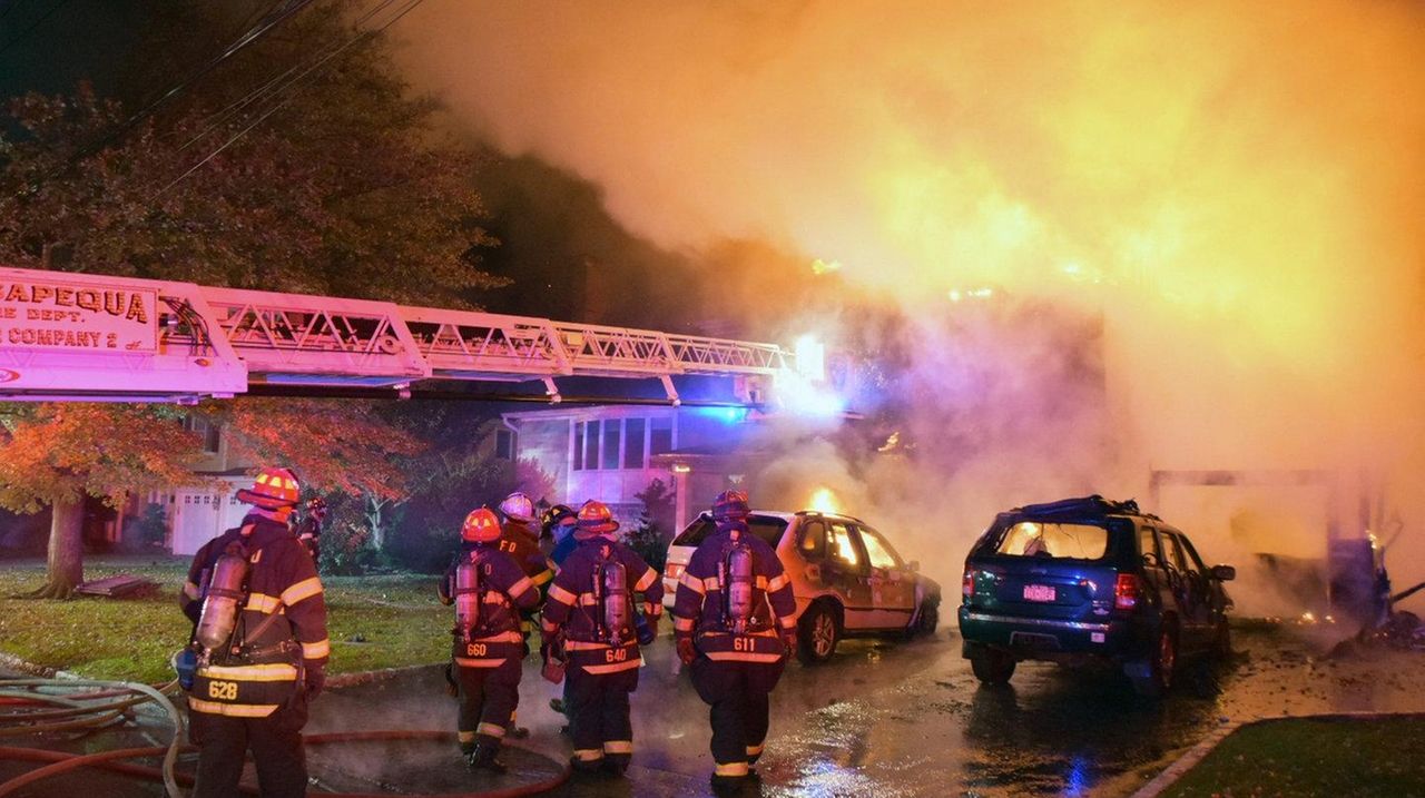 Massapequa house fire damages vehicles and boat, officials say Newsday