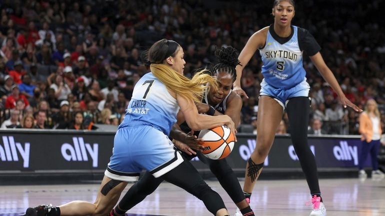 Chicago Sky guard Chennedy Carter (7) steals the ball from...