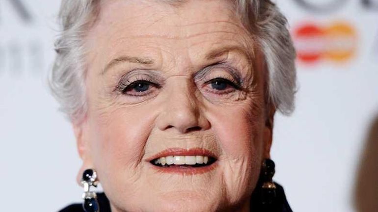 Actress Angela Lansbury poses in the press room during The...