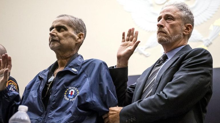 Retired NYPD Det. Luis Alvarez with Jon Stewart before Congress...