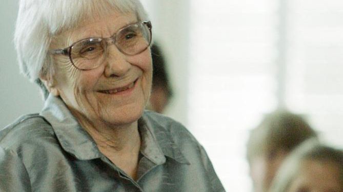 Author Harper Lee smiles during a ceremony honoring