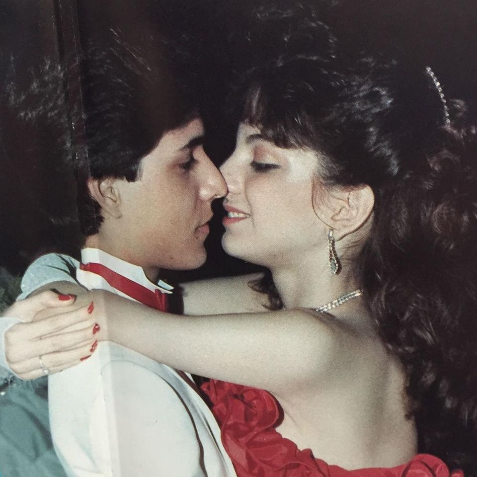 A couple shares a romantic moment on the