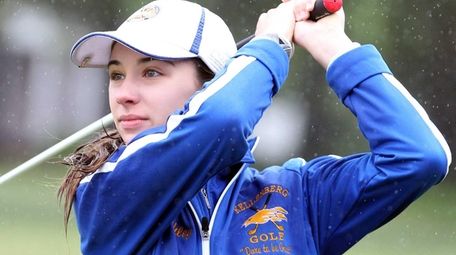 Ashley Harding from Kellenberg watches her drive at