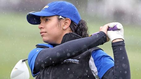 Nicolette Dilluvio from Kellenberg tees off in the