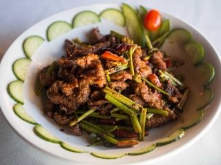 Fried cumin lamb is a Sichuan dish served